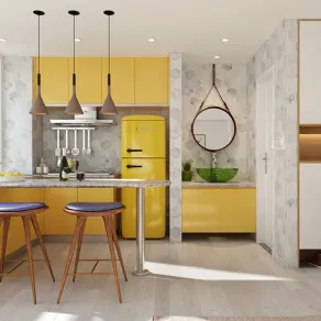 Domina il giallo in questo open space con cucina con penisola. Fonte: designferia.com