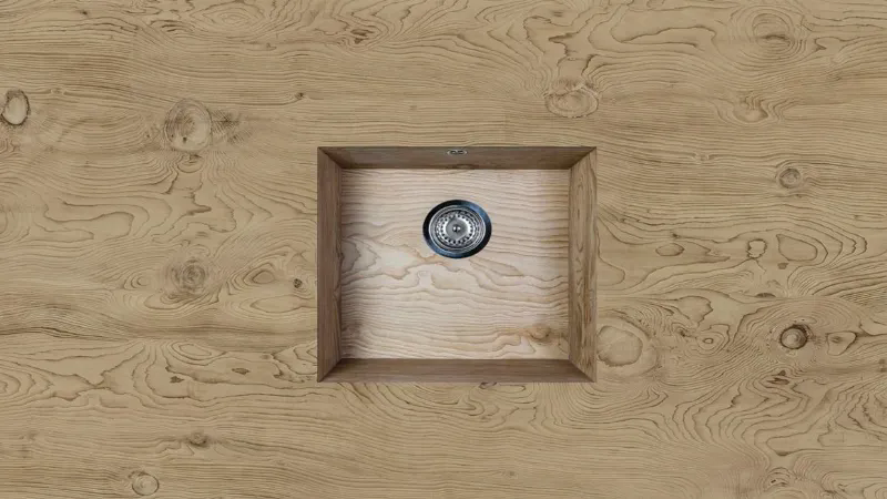 Un lavello in gres effetto legno, da Minunco Stone Design