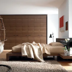 Camera da letto essenziale vintage in legno