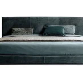 Letto compatto modello “Max” di Twils, rivestimento in tessuto, con giroletto h 14 cm e piedini in ferro h 18 cm