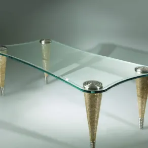 tavolino con piano in vetro trasparente e quattro gambe dorate