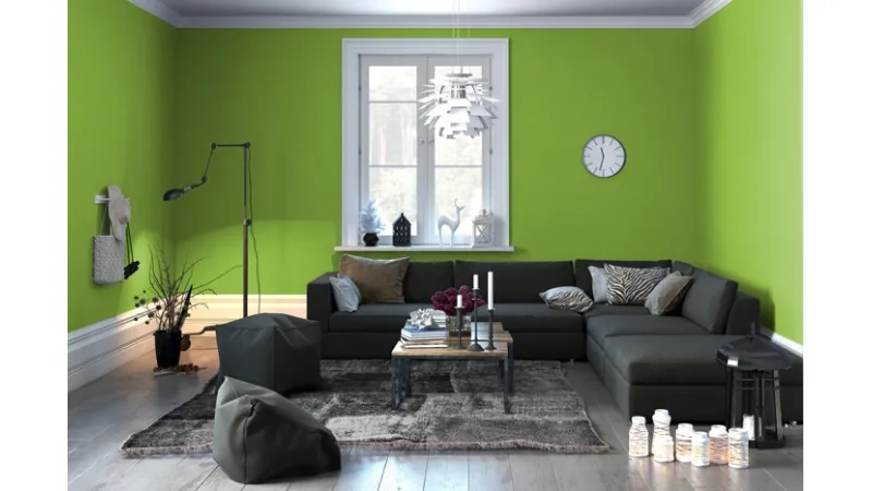 Zona living dal design minimale in verde e grigio