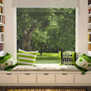 Area relax fronte vetrata con librerie laterali