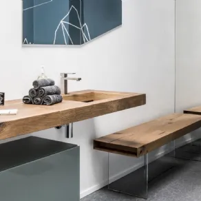 Bagno moderno con lavandino in legno grezzo di Lago 