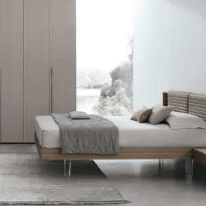 Nel sistema letto Yuki Tomasella sono integrati i comodini sospesi 