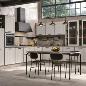Skill di Modulnova. Cucina con isola e living coordinato