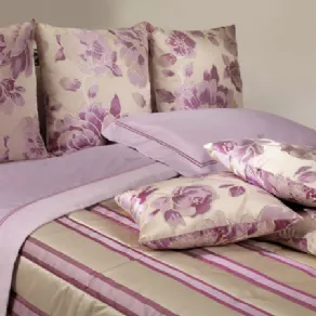 Rose sui cuscini per il letto