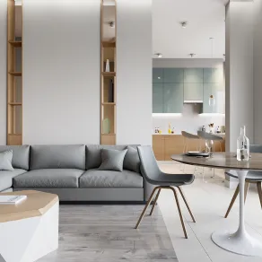 Pochi colori e materiali (bianco, grigio, legno) mixati tra loro rendono il living leggero ed equilibrato, decisamente più grande.