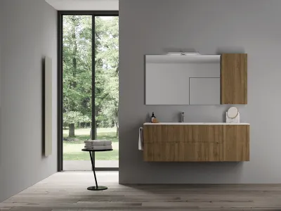 Eleganza essenziale e funzionalità per questa composizione in legno dogato della collezione Smyle di Blob by Ideagroup