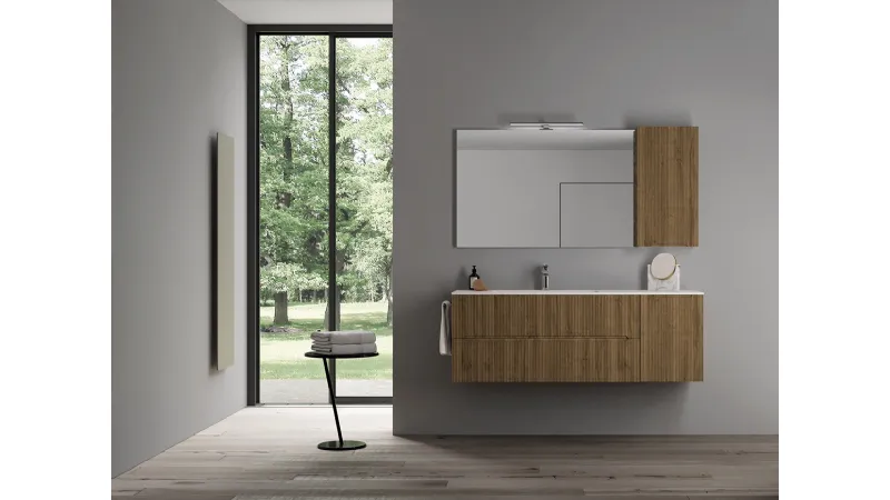 Eleganza essenziale e funzionalità per questa composizione in legno dogato della collezione Smyle di Blob by Ideagroup