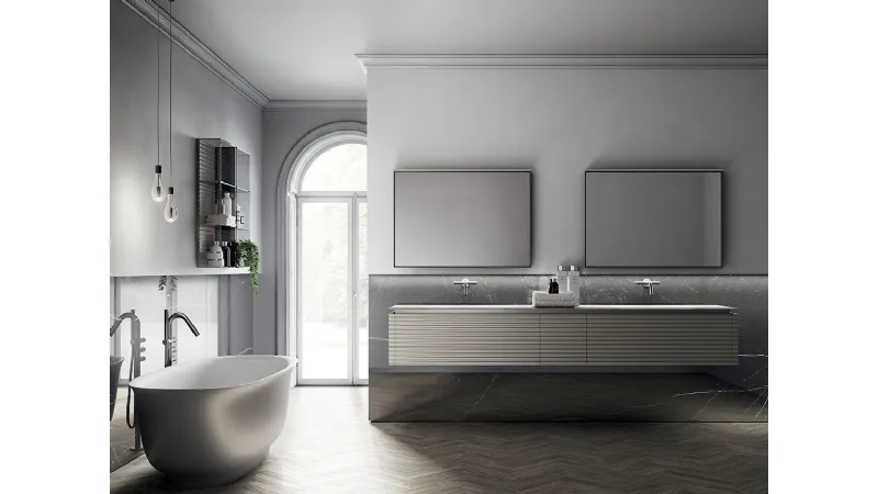 I volumi sofisticati e sinuosi della collezione d'arredo bagno Dolcevita di Ideagroup