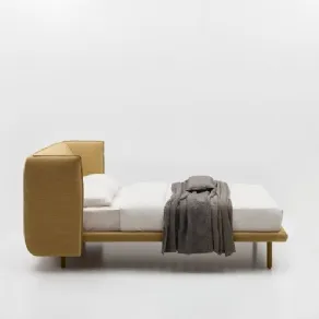 letto con testiera in tessuto