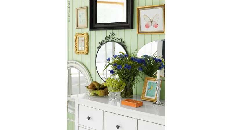 Decorare casa con le cornici