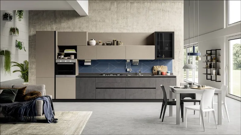 Una parete sfumata che riprende i colori degli elementi della cucina Kaya Stosa 