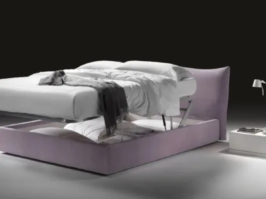 Letto imbottito contenitore testata capitonnè modello Vintage By Frauflex