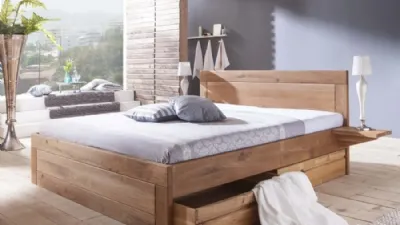 letto in legno con cassetti