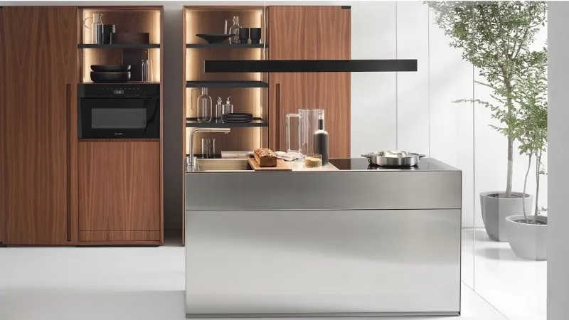 Inox e legno per l’insieme Small Living Kitchens by Falper