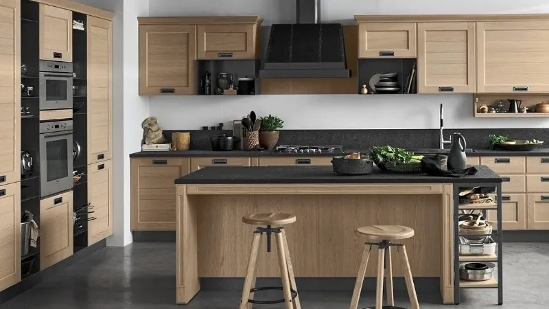 Da un lato contenitore, dall’altro tavolo snack con due sgabelli: l’isola York di Stosa Cucine