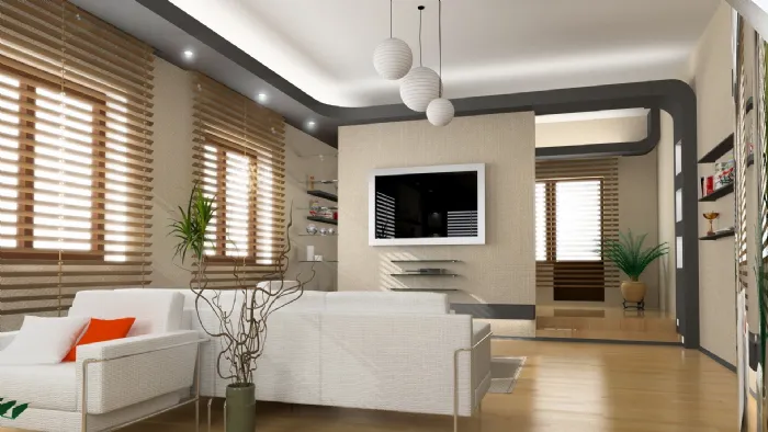 zona living con lampadari a sfere bianche, divani bianchi e parquet in legno chiaro, porta trasparente con grafiche bianche