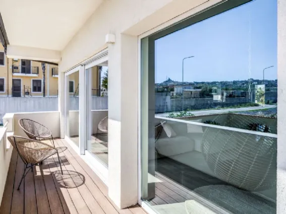 Annulla i confini tra interno ed esterno con gli infissi scorrevoli tutto vetro