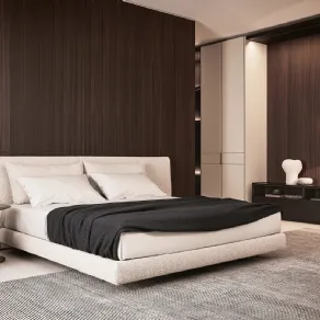 Yume di Poliform. Letto imbottito con testata morbida e inserti in cuoio ispirati al mondo della moda