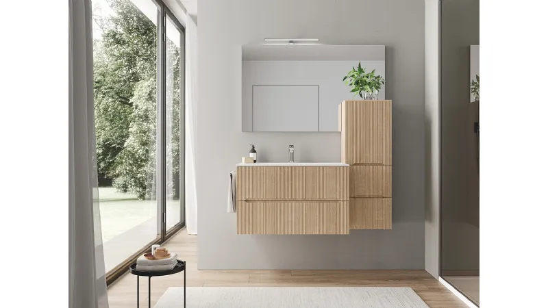 Forme essenziali e tanto spazio contenitivo per i mobili bagno Smyle