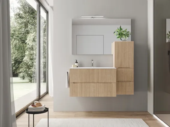 Forme essenziali e tanto spazio contenitivo per i mobili bagno Smyle