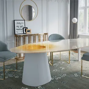 Eclittica di Unica è il tavolo design con piano in vetro verniciato bianco e struttura in acciaio, decorato con fresatura manuale e polvere dorata, illuminazione interna regolabile (310x145 cm)