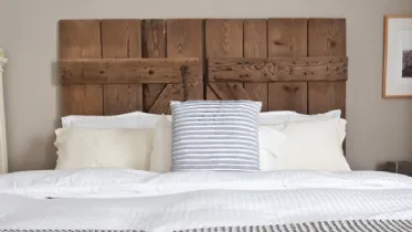 testata letto con cuscini