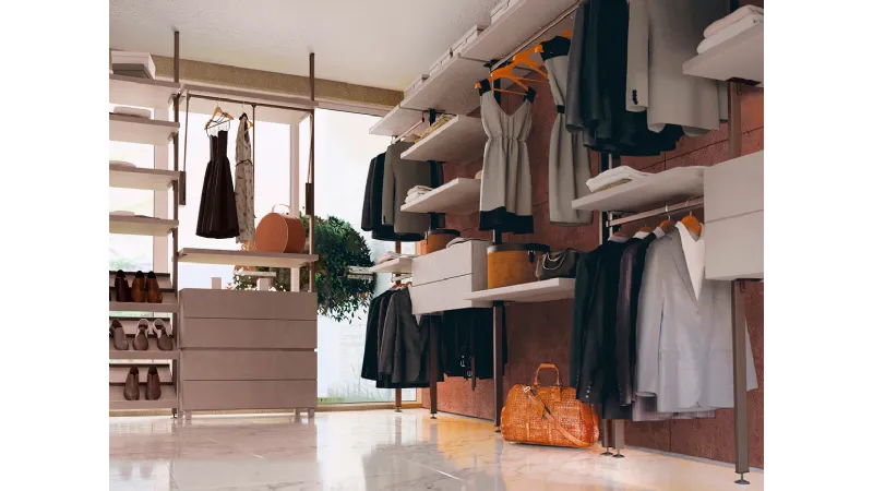 Una struttura a palo, leggera e versatile, caratterizza l'armadiatura per guardaroba Axial System