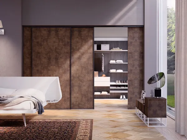 Rack System è l'elegante cabina armadio con boiserie personalizzabile al centimetro del brand Dielle Domus